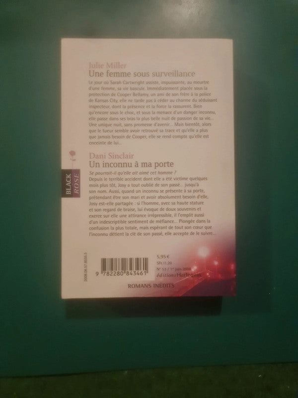 Julie Miller ,
Une femme sous surveillance , Dani Sinclair ,
Un inconnu à ma porte