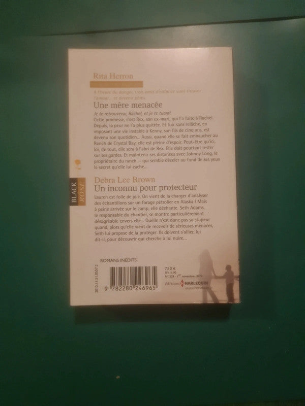 Rita Herron : Une mère menacée , Debra Lee Brown
Un inconnu pour protecteur