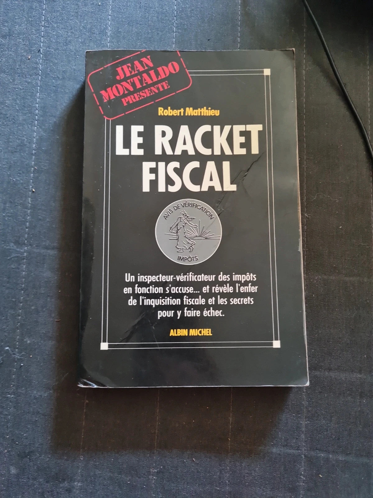 Le racket fiscal - un inspecteur verificateur des impots en fonction
Matthieu Robert
