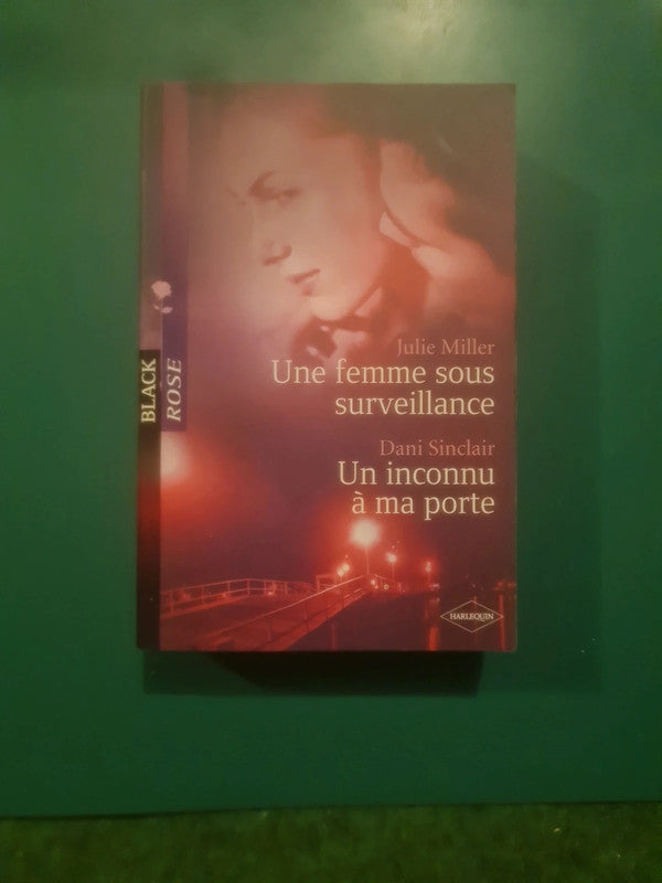 Julie Miller ,
Une femme sous surveillance , Dani Sinclair ,
Un inconnu à ma porte