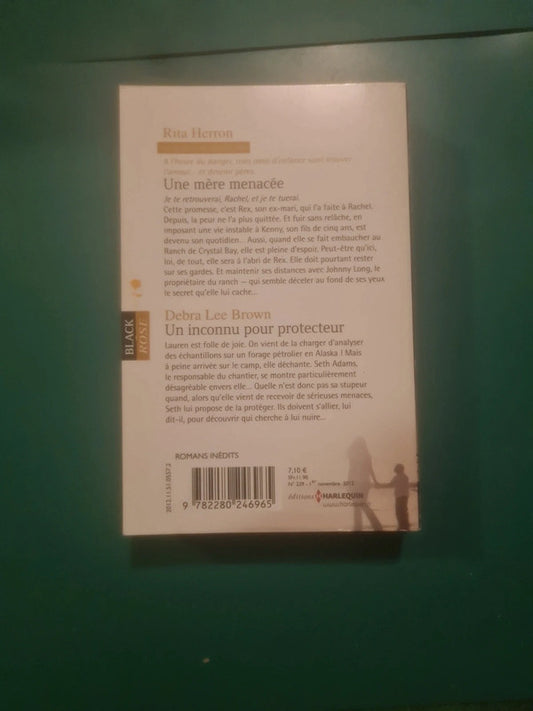Rita Herron : Une mère menacée , Debra Lee Brown
Un inconnu pour protecteur