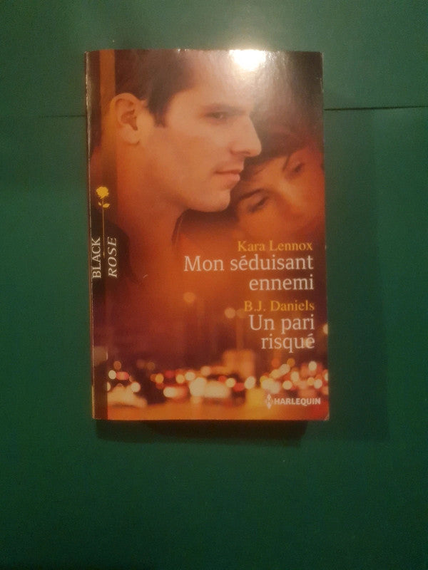 Kara Lennox
: Mon séduisant ennemi , B.J. Daniels
Un pari risqué