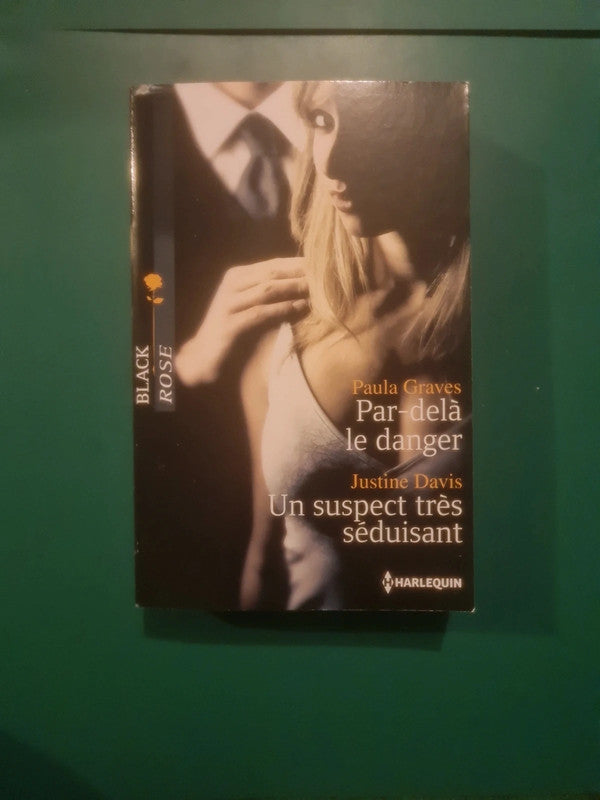 Paula Graves : Par-delà le danger , Justine Davis
: Un suspect très séduisant