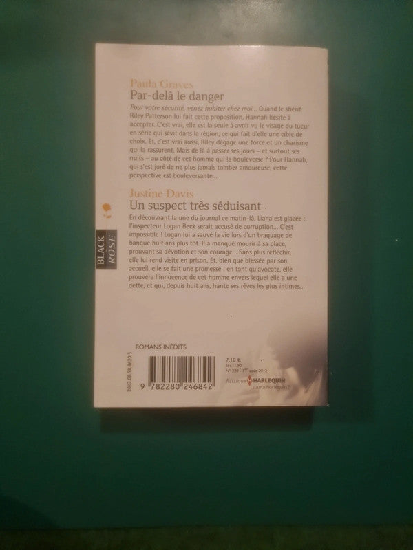 Paula Graves : Par-delà le danger , Justine Davis
: Un suspect très séduisant