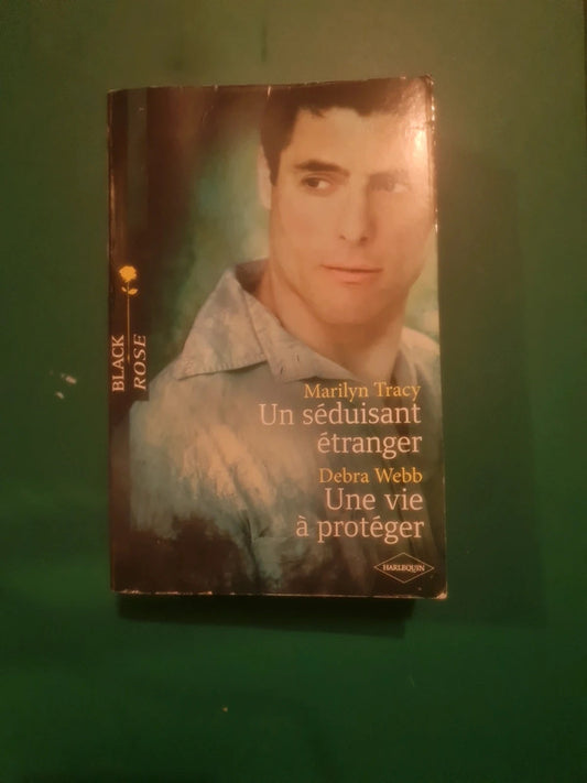 Marilyn Tracy
: Un séduisant étranger , Debra Webb
: Une vie à protéger