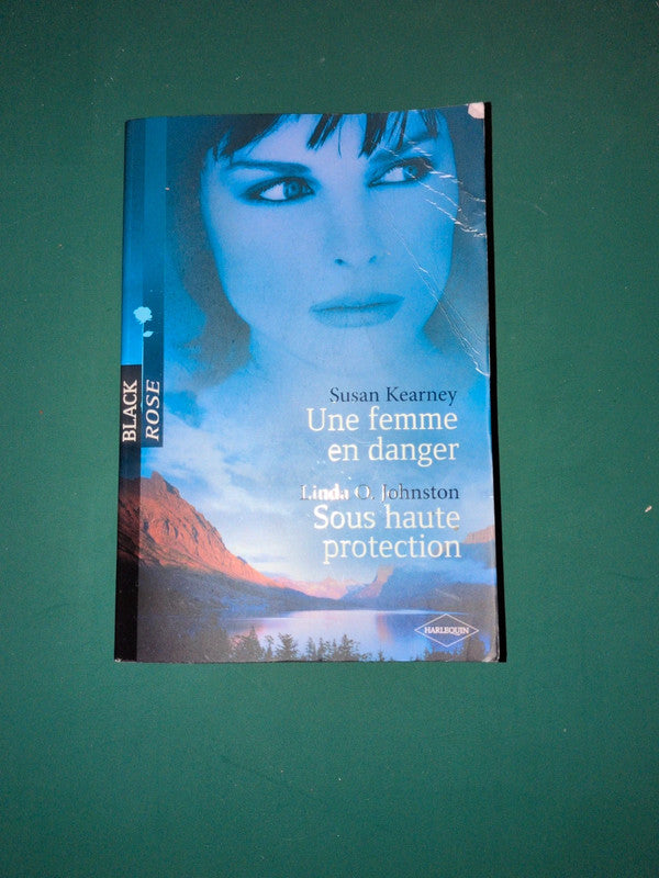 Susan Kearney
, Une femme en danger , Linda O. Johnston
Sous haute protection