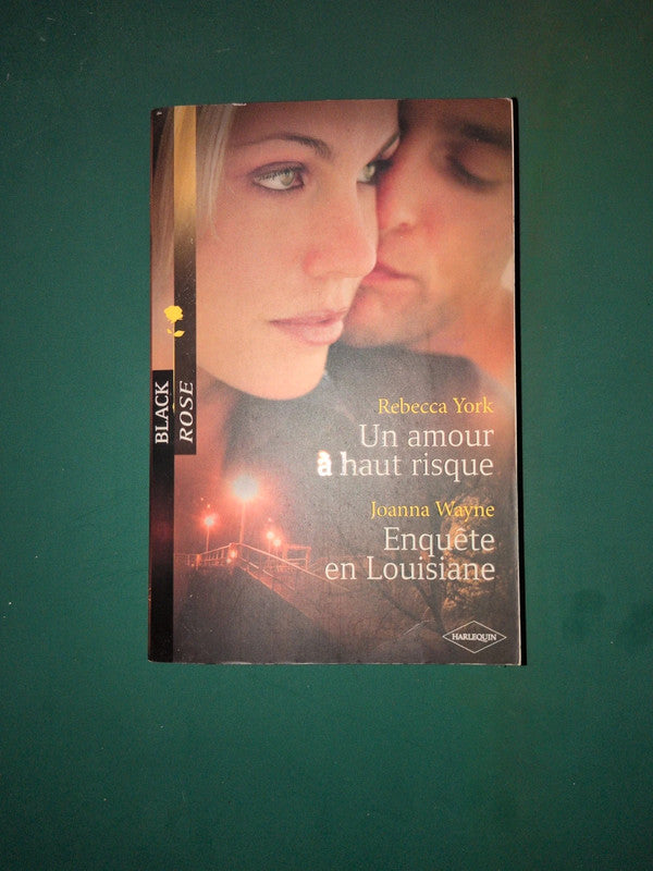 Rebecca York
, Un amour à haut risque , Joanna Wayne
Enquête en Louisiane