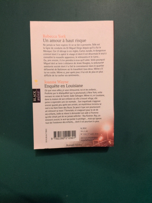 Rebecca York
, Un amour à haut risque , Joanna Wayne
Enquête en Louisiane