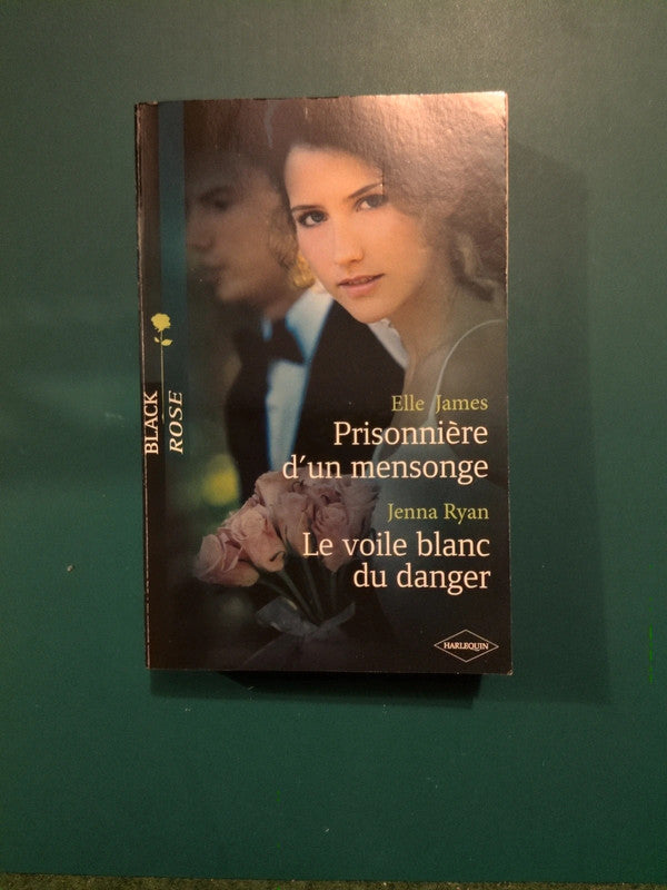 Elle James
, Prisonnière d'un mensonge , Jenna Ryan
Le voile blanc du danger