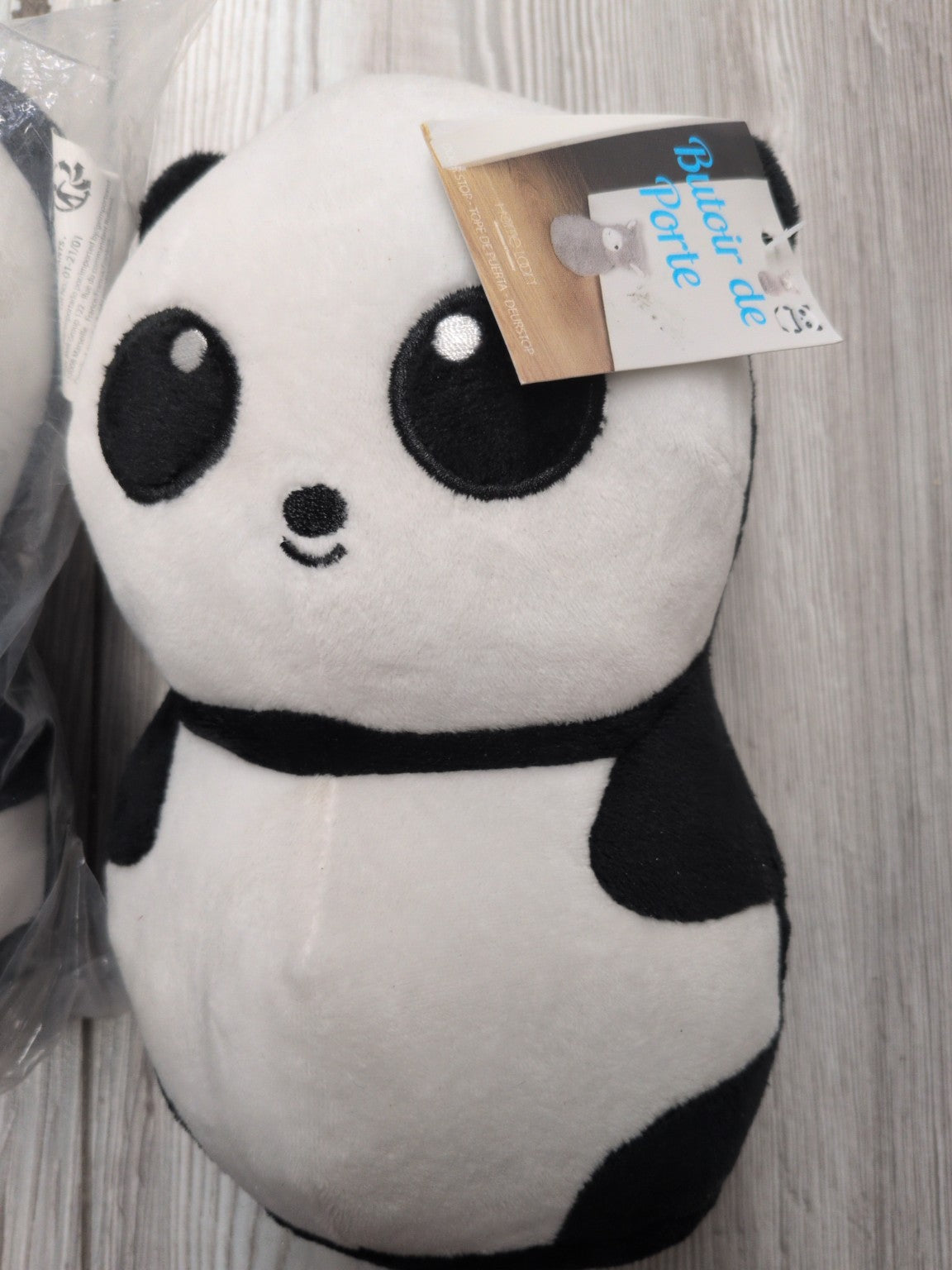 Butoir de porte panda en peluche – détail et étiquette