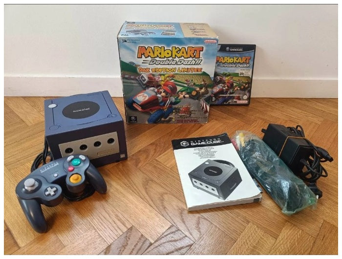 Nintendo GameCube violette avec manette, pack Mario Kart Double Dash Zelda, câbles et documentation